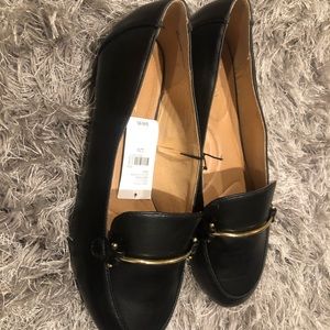 Black flats with gold details